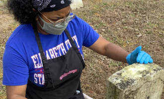 Headstone cleaning at Oak Grove Cemetery