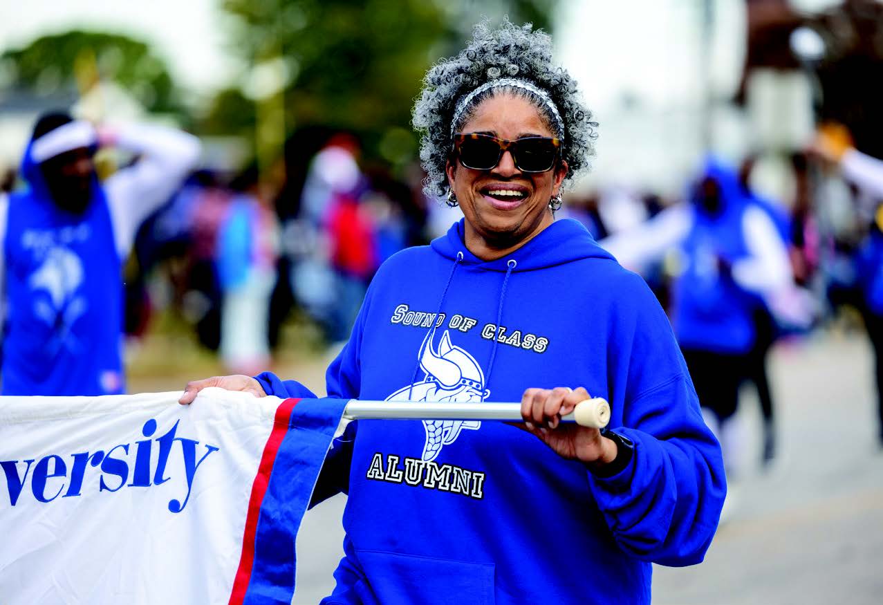female alum during parade