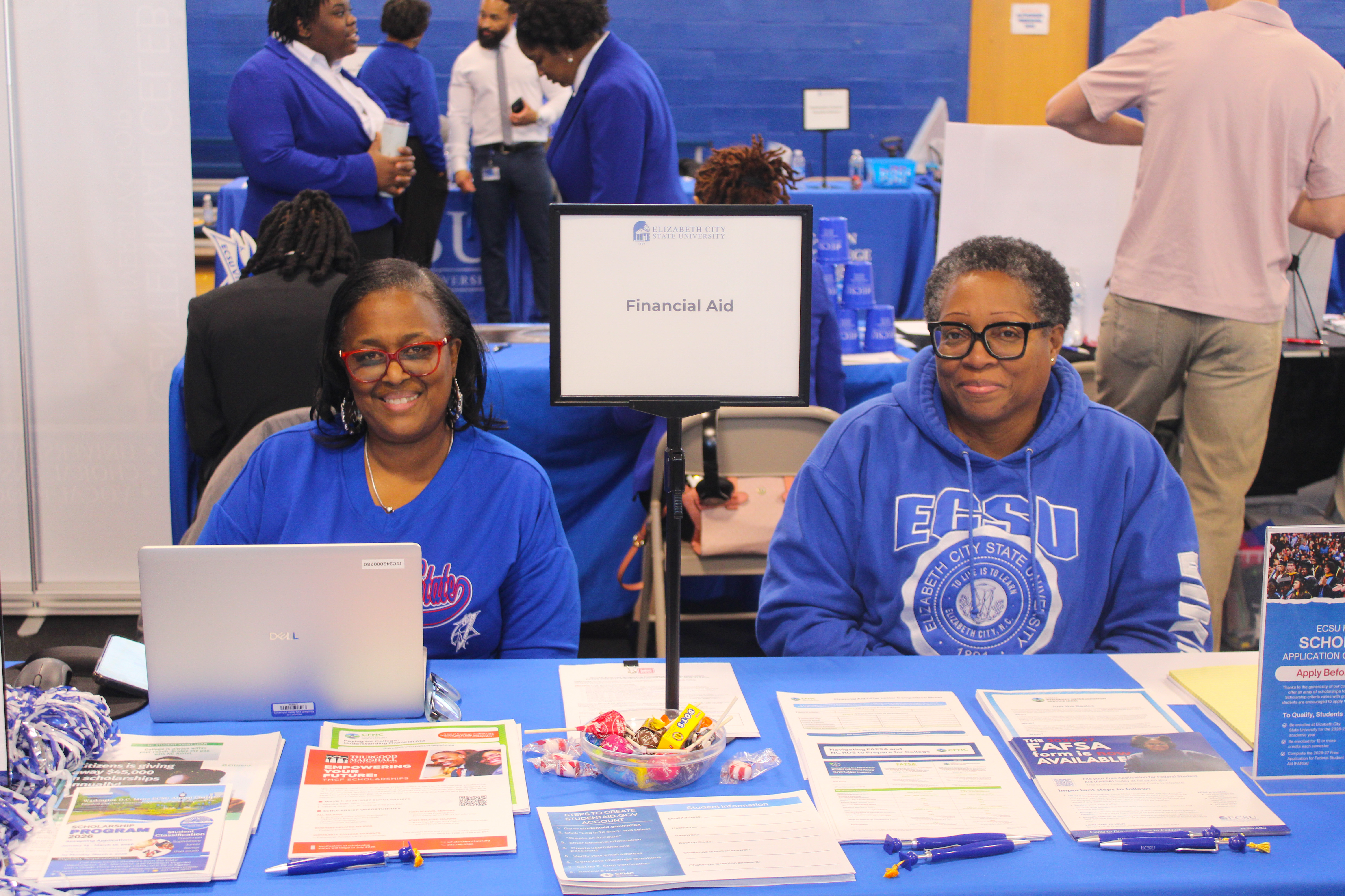 Smiling Financial Aid staff ready to help at ECSU Open House event